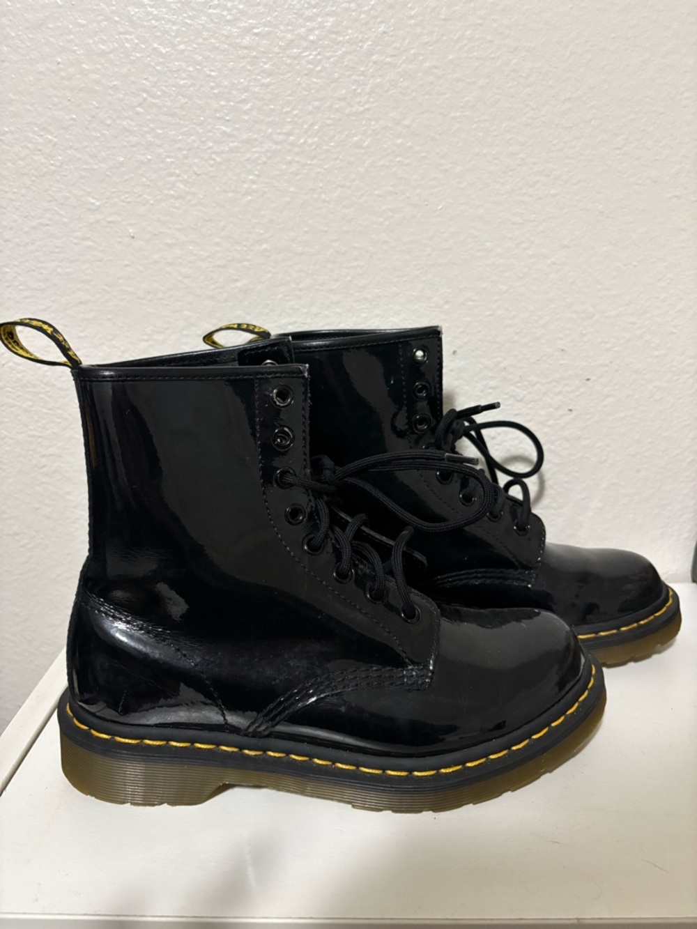 Black Patent Leather Dr. Martens Lace-Up Combat Boots with Yellow Stitching